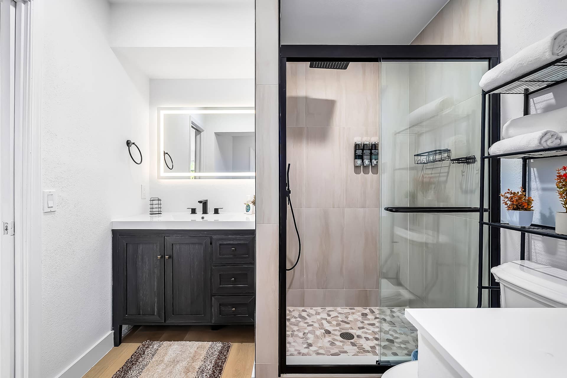 1250 SE 10TH Street, Deerfield Beach, Deerfield Beach, FL 33441 Modern bathroom featuring a dark wood-finish vanity with a white countertop and rectangular sink