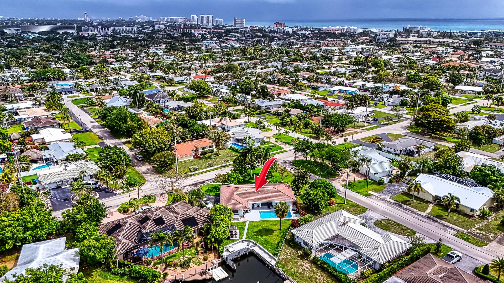 1250 SE 10TH Street, Deerfield Beach, Deerfield Beach, FL 33441 Aerial perspective of a residential neighborhood featuring a property with a private pool