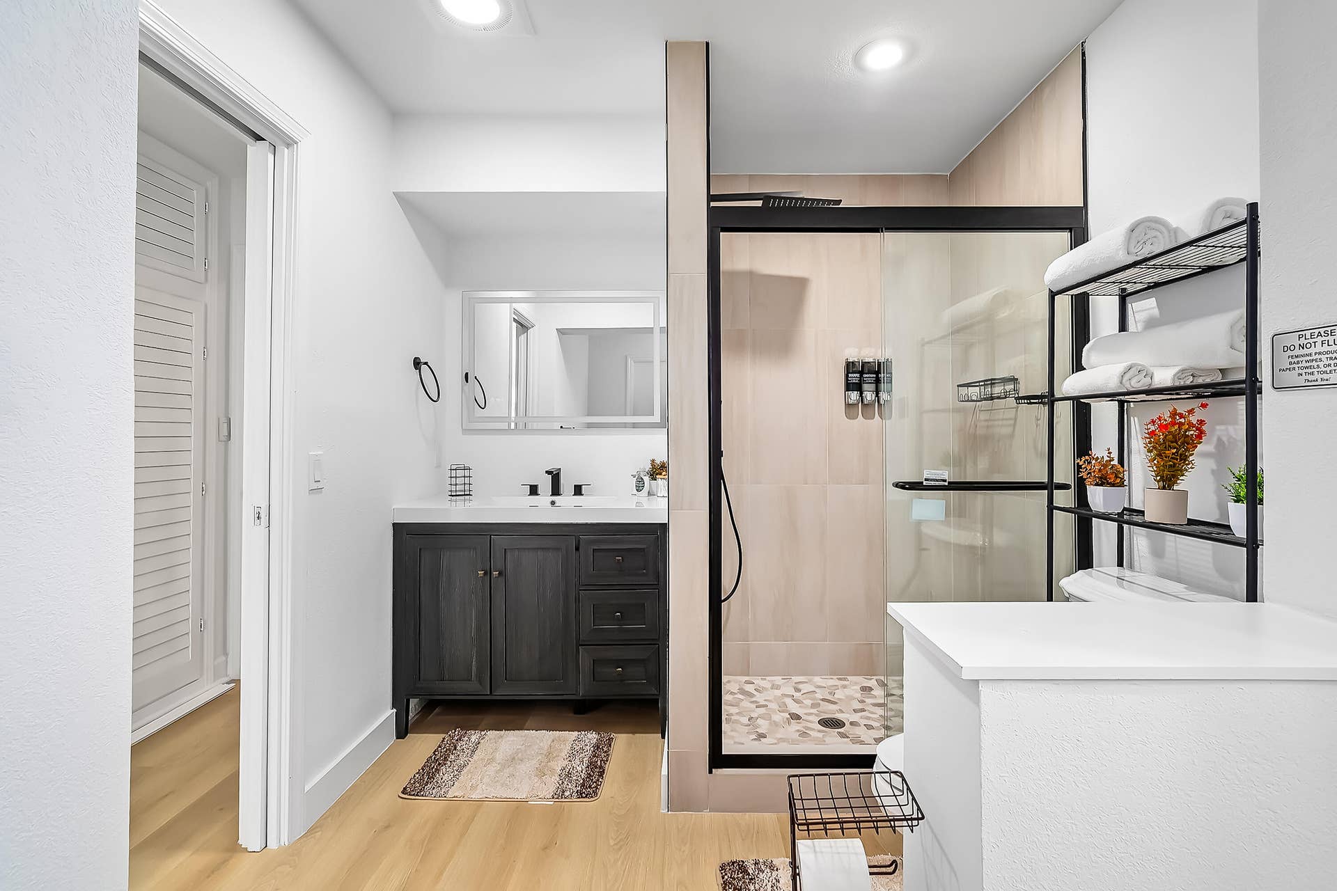 1250 SE 10TH Street, Deerfield Beach, Deerfield Beach, FL 33441 Contemporary bathroom featuring a dark wood-finish vanity with a white countertop and rectangular mirror