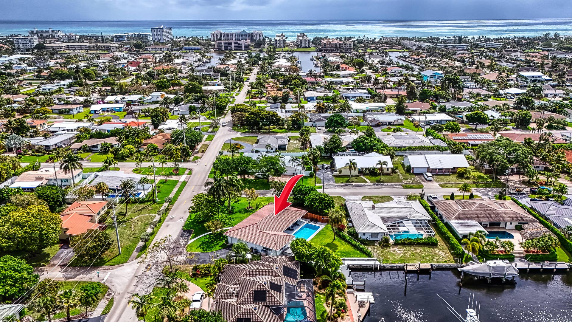 1250 SE 10TH Street, Deerfield Beach, Deerfield Beach, FL 33441 Residential property featuring a rectangular pool and mature landscaping