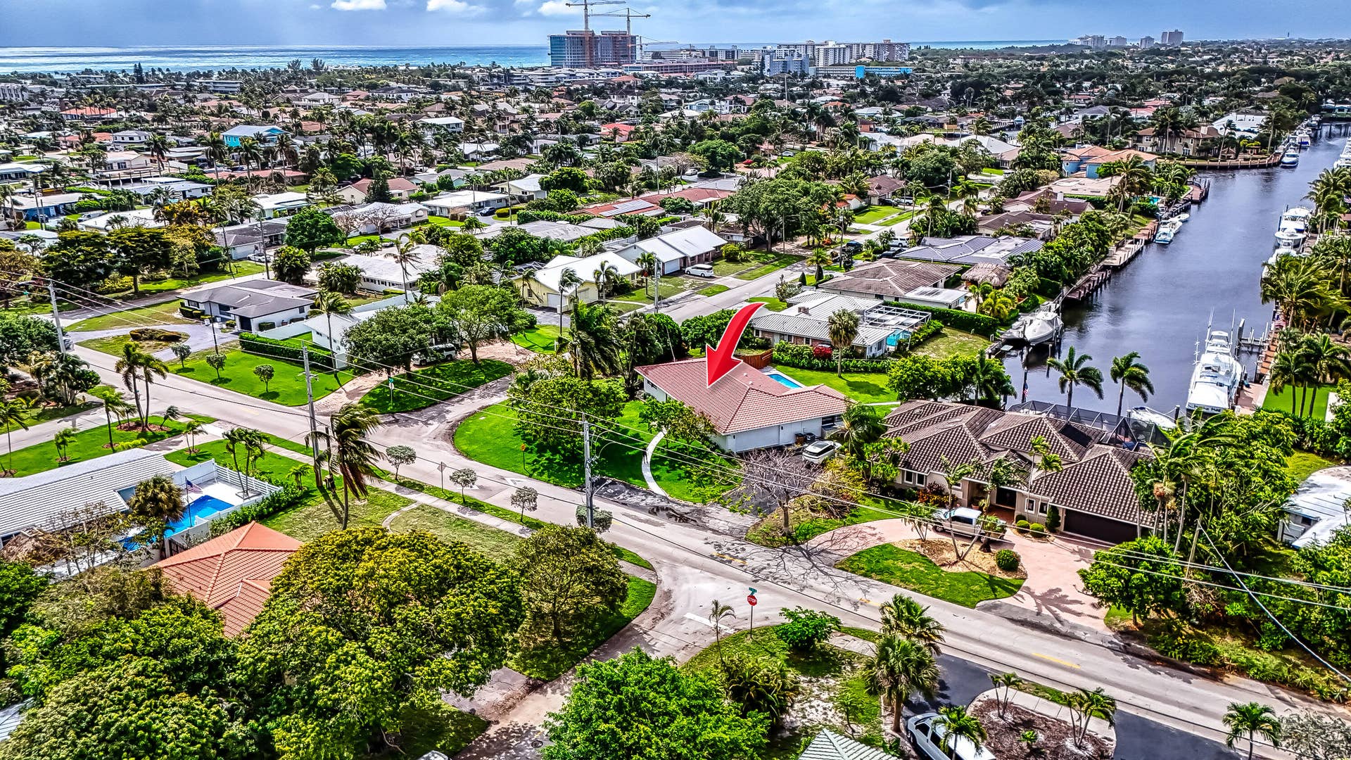 1250 SE 10TH Street, Deerfield Beach, Deerfield Beach, FL 33441 Property featuring a terracotta tile roof, a swimming pool, and a private dock on a canal
