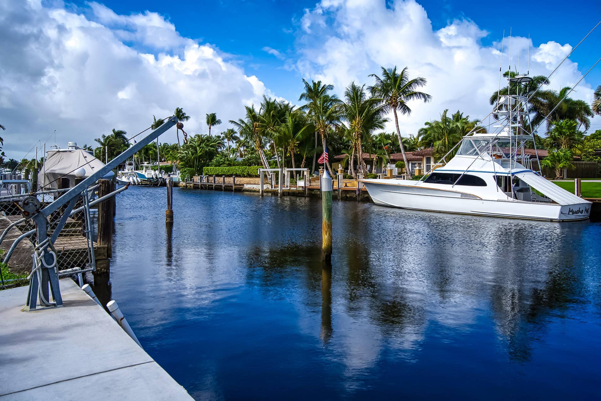1250 SE 10TH Street, Deerfield Beach, Deerfield Beach, FL 33441 Waterfront access featuring a concrete dock, boat lift structure, and deep water canal