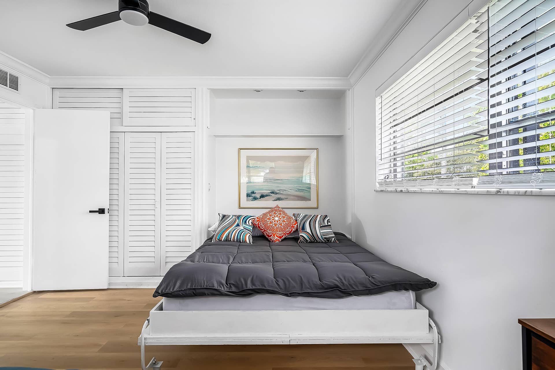 1250 SE 10TH Street, Deerfield Beach, Deerfield Beach, FL 33441 Bedroom featuring wood-finish flooring and a ceiling fan
