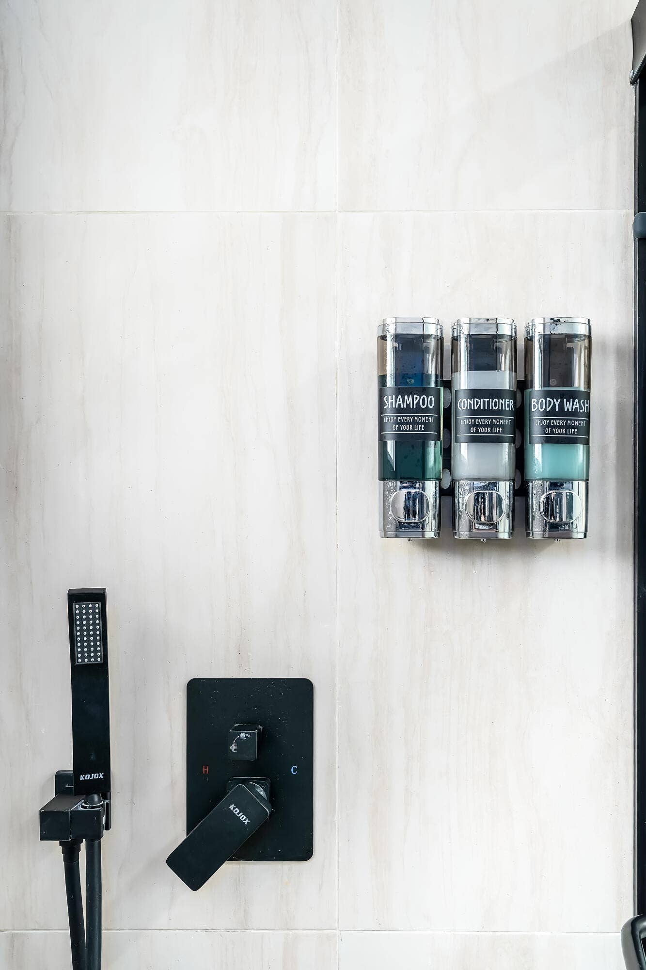 1250 SE 10TH Street, Deerfield Beach, Deerfield Beach, FL 33441 White subway tile shower surround featuring matte black fixtures and a handheld showerhead