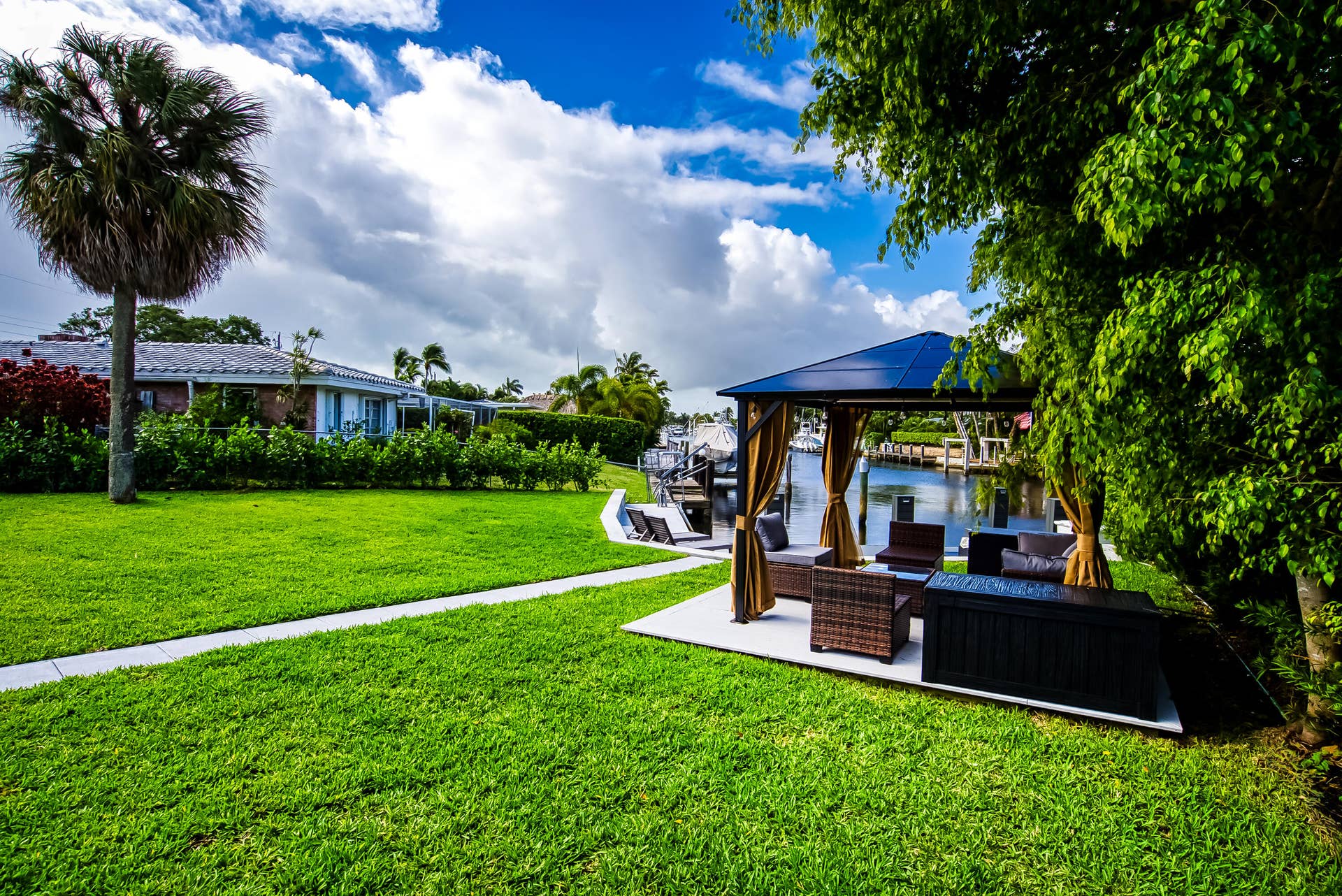 1250 SE 10TH Street, Deerfield Beach, Deerfield Beach, FL 33441 Waterside gazebo on a concrete patio with perimeter landscaping