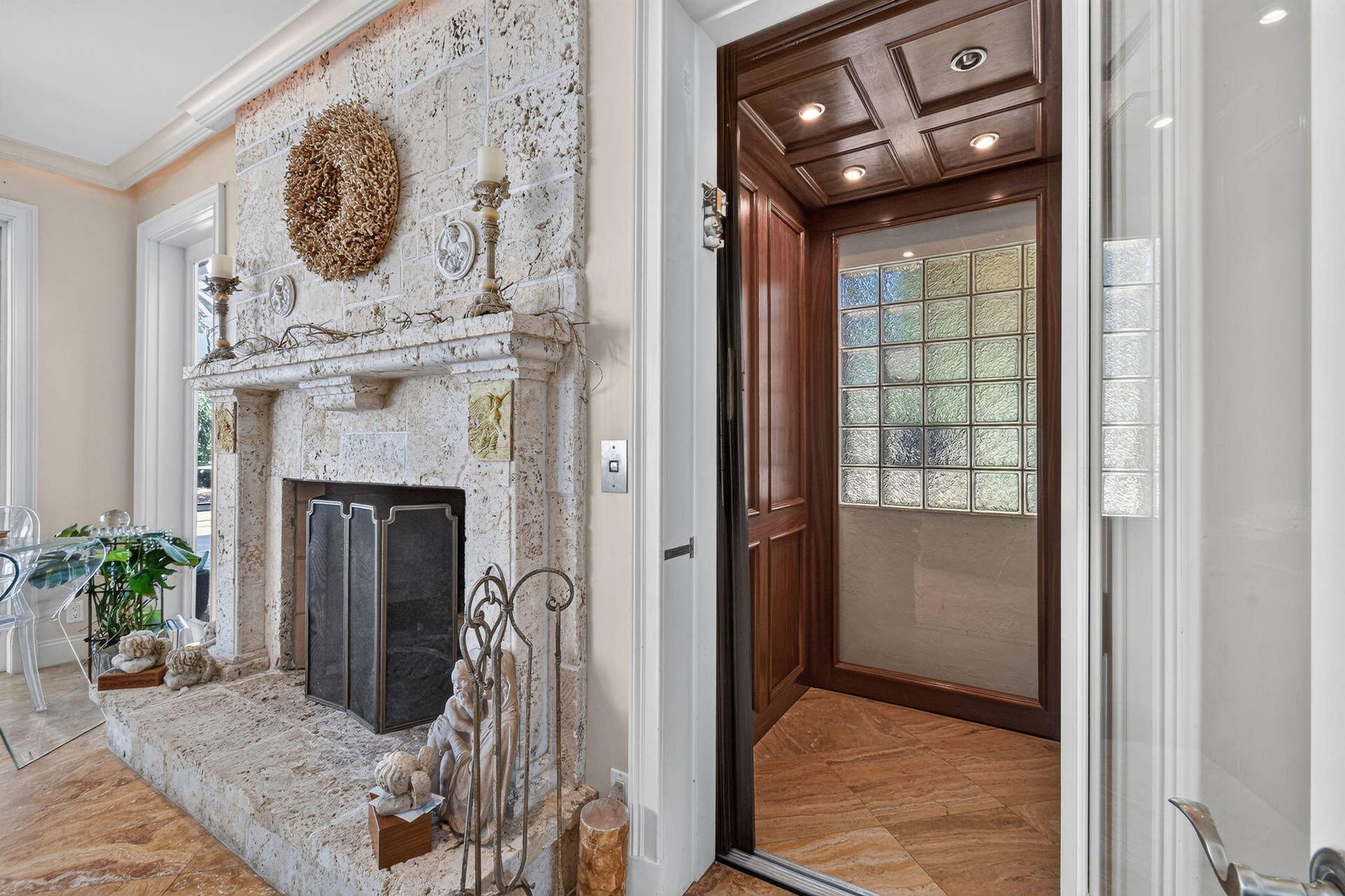 841 ANCHORAGE Drive, North Palm Beach, FL 33408 Wood burning fireplace and custom elevator