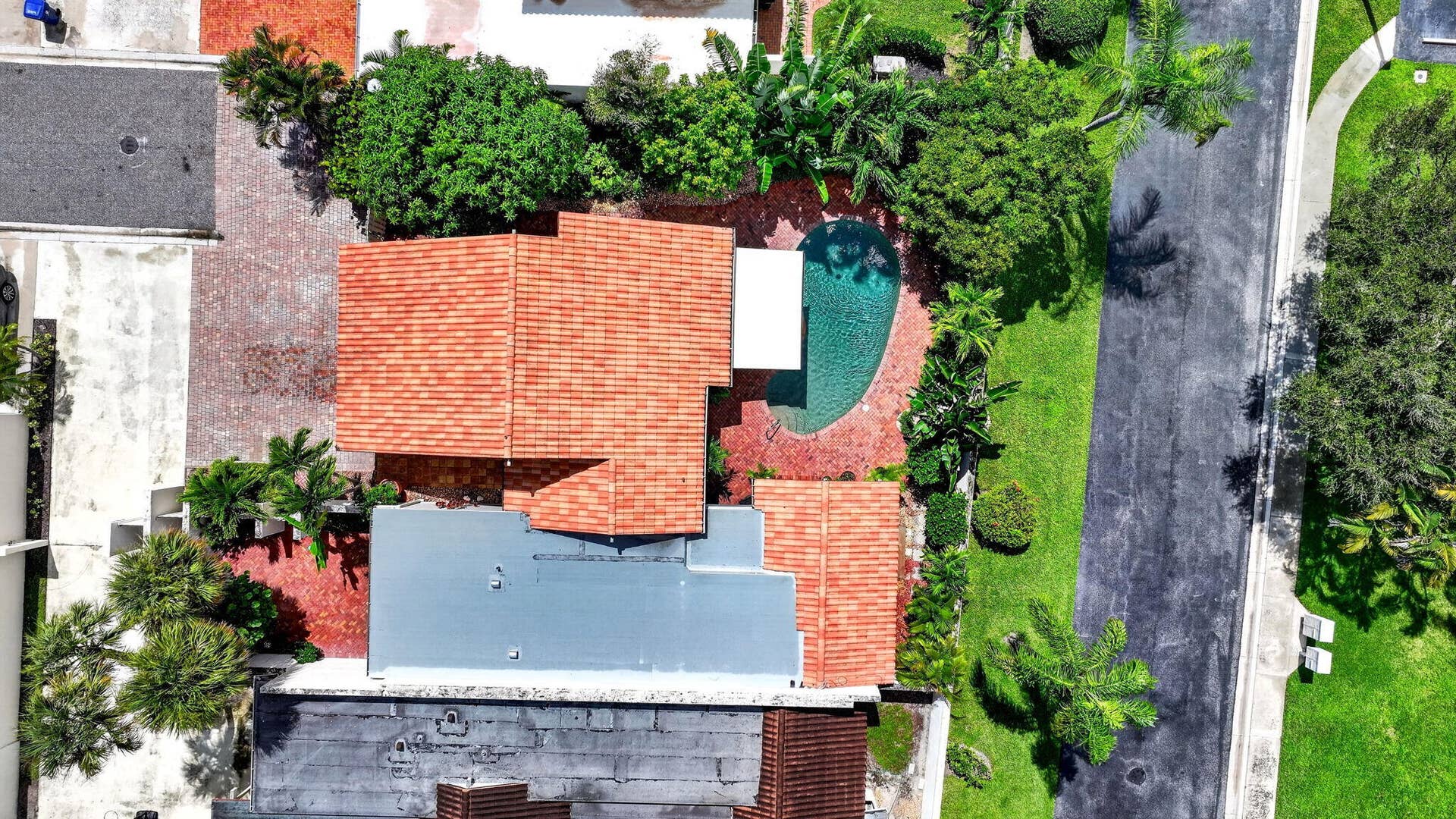 105 SANDPIPER Circle W, Jupiter, FL 33477 Expansive Parking for Up to 6 Vehicles & Exceptional Private Yard (Backs to Adjacent Community Road - No Neighbor to Rear)