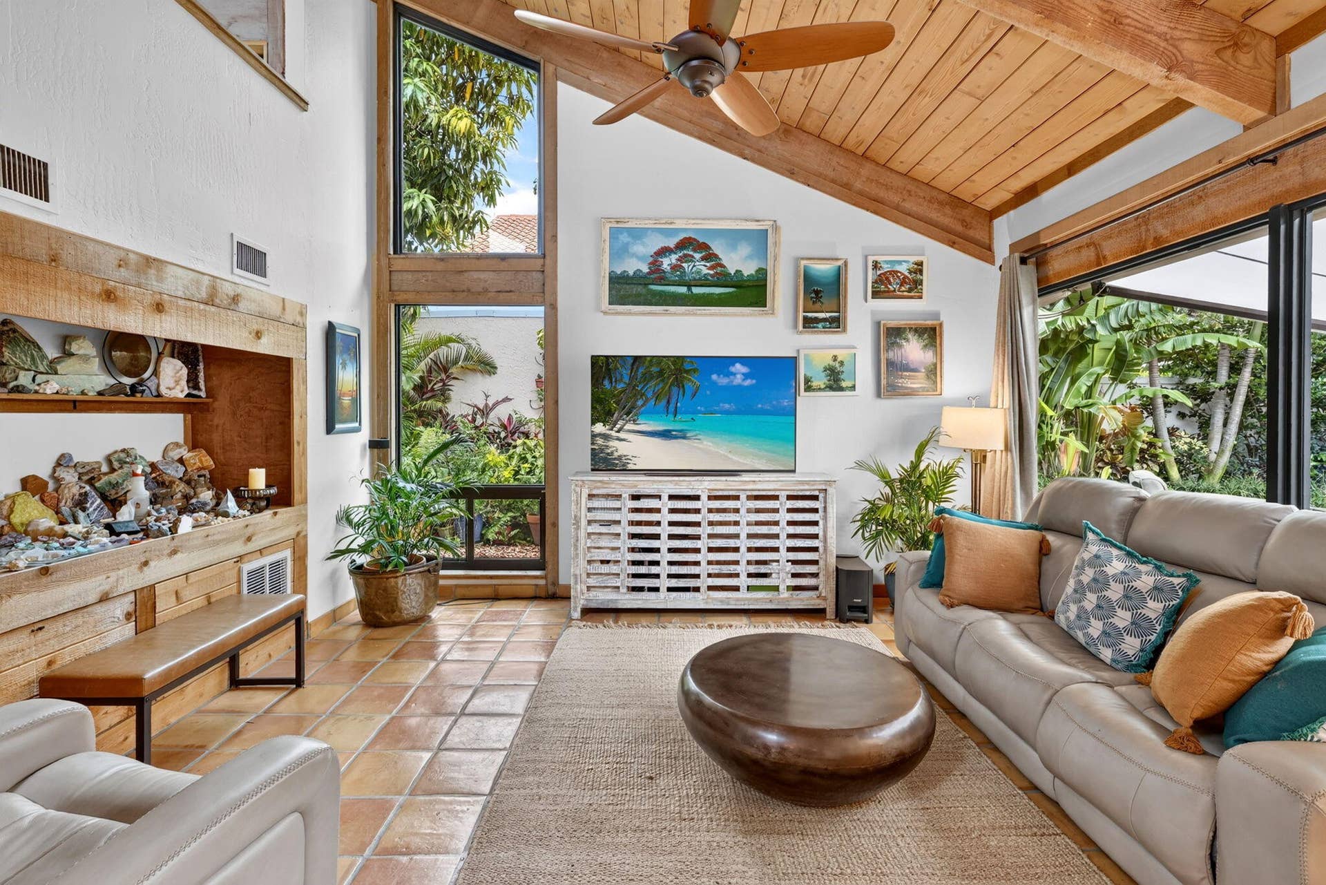105 SANDPIPER Circle W, Jupiter, FL 33477 Living Room w/ Expansive Impact Windows & Beautiful Tropical Landscaped Views