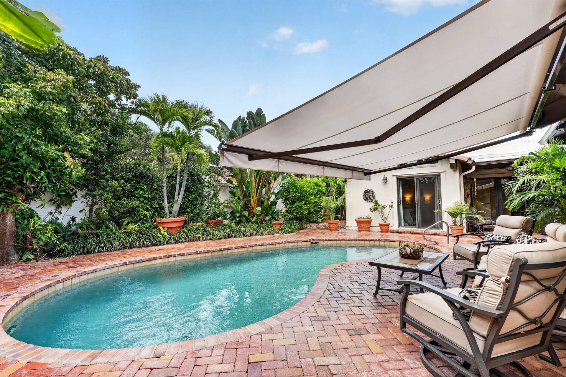 105 SANDPIPER Circle W, Jupiter, FL 33477 Beautiful Lush Tropical Landscaping
