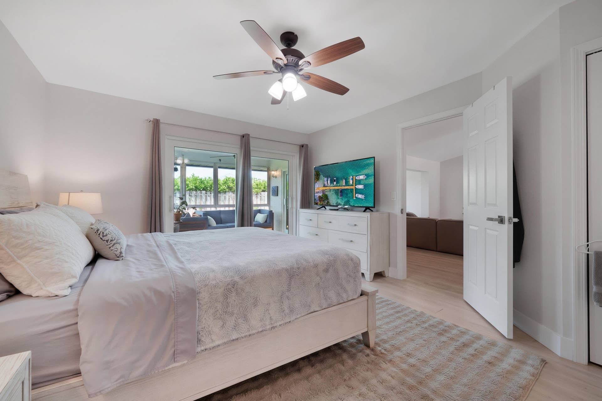 129 Stillwater Circle, Jupiter, FL 33458 Master Bedroom Angle #3 to Lanai & Living Room
