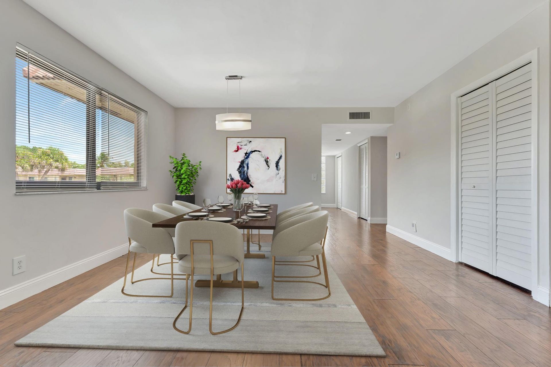 Cool toned fresh paint, smoothed walls and ceilings, sleek lighting fixture provide a contemporary appeal