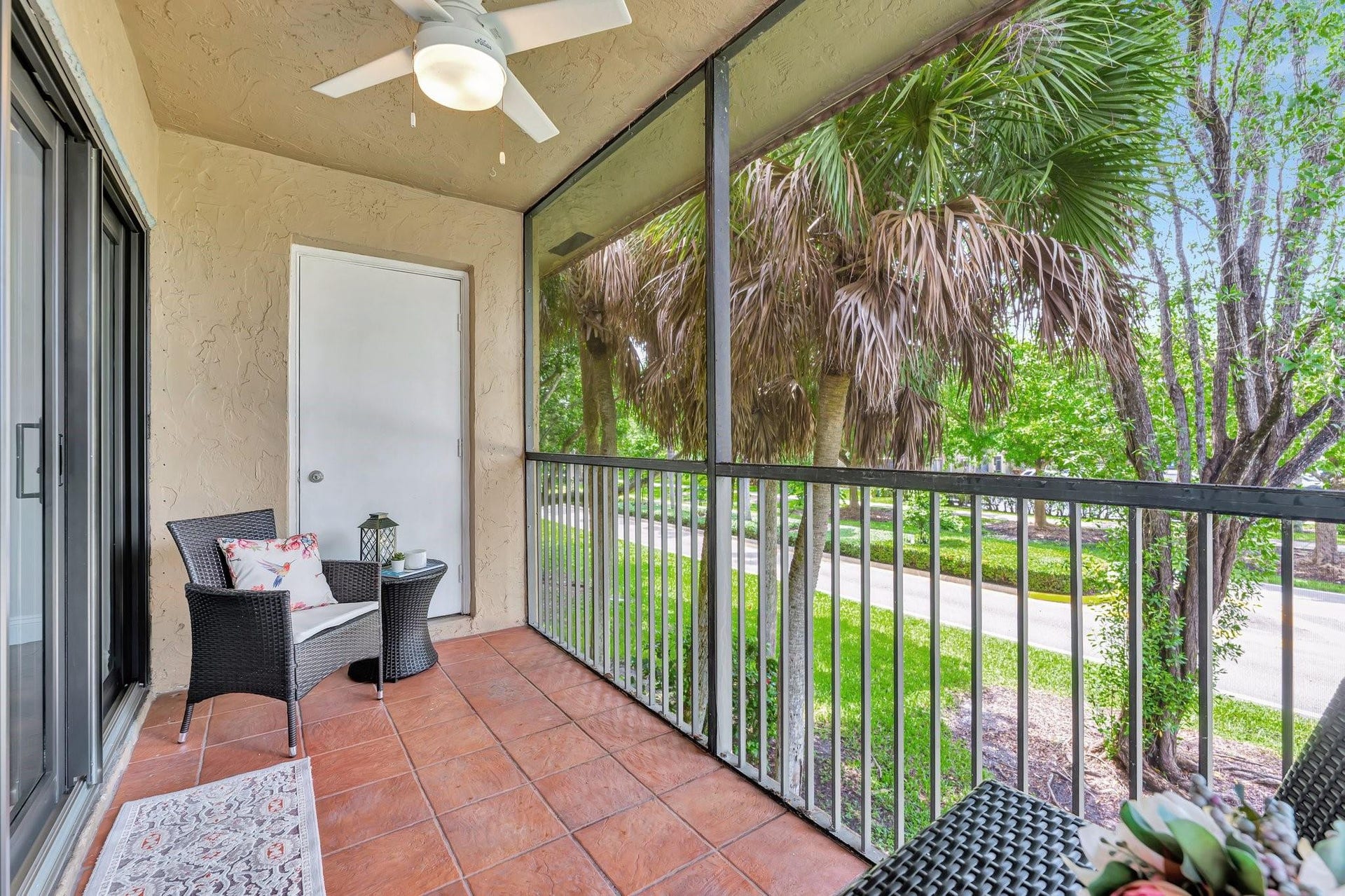 Sit and enjoy overlooking the green landscape. Extra storage closet.