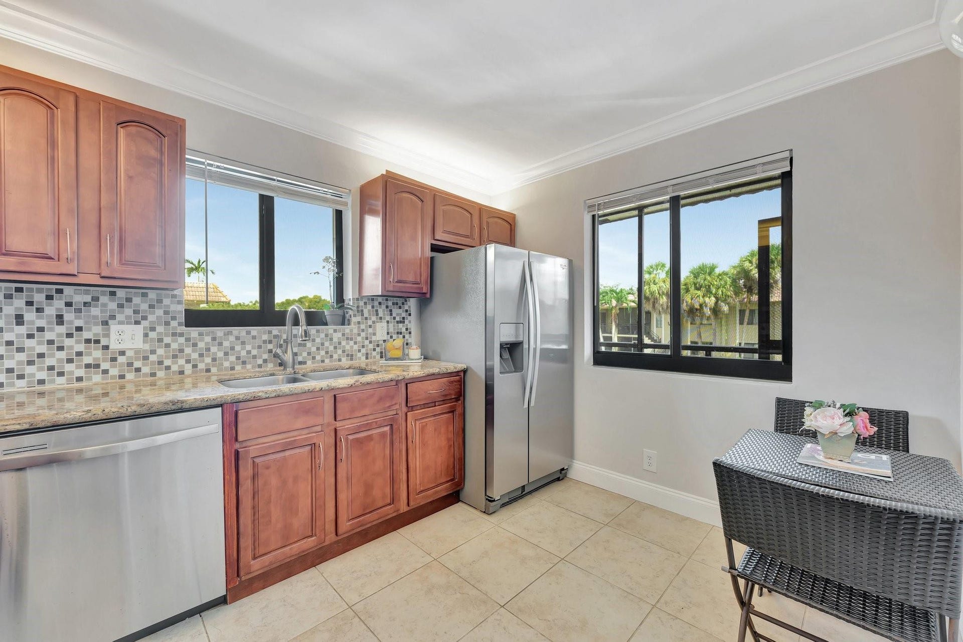 Eat-in kitchen overlooks the front patio.