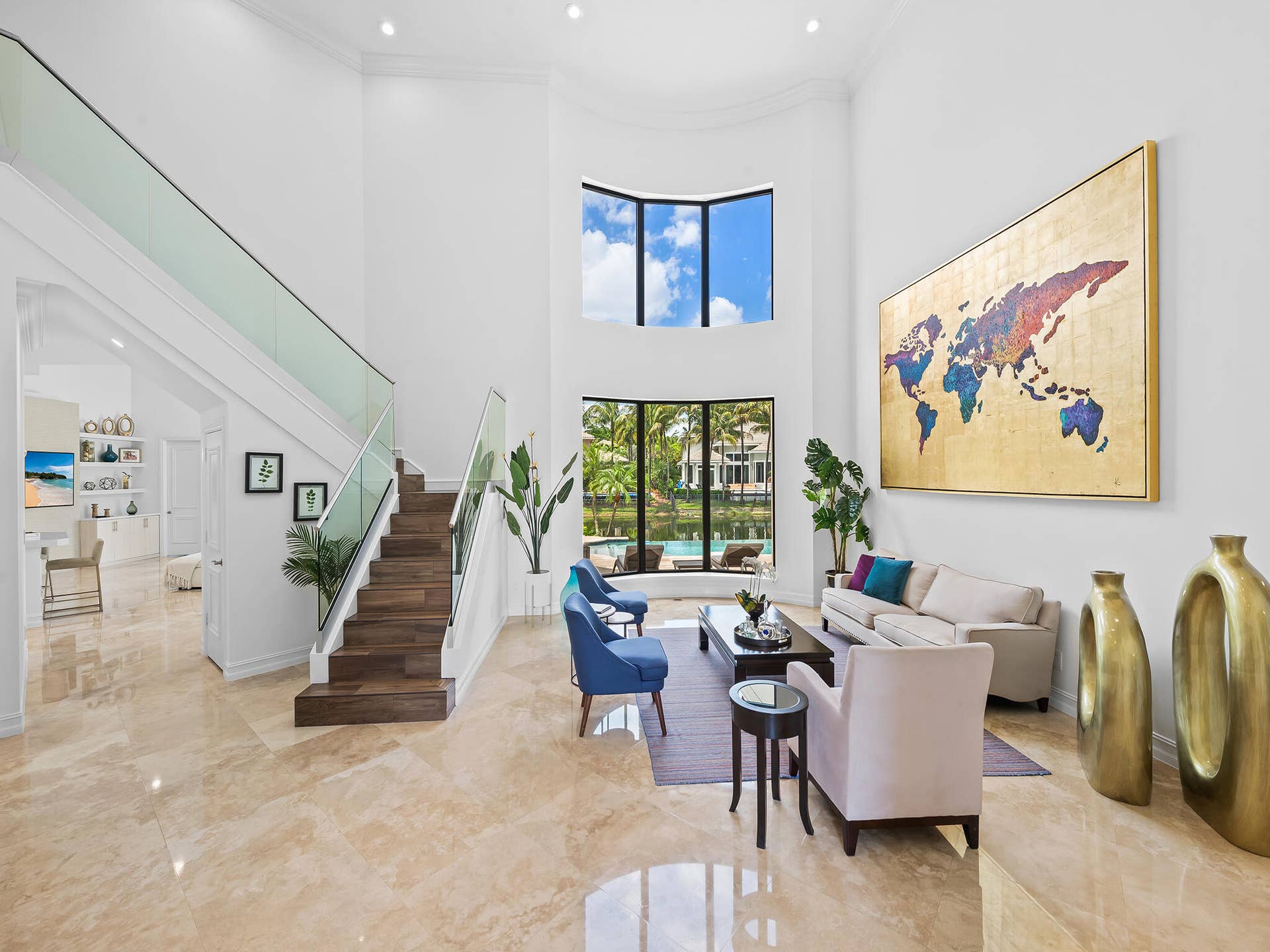 10241 KEY PLUM Street, Plantation, FL 33324 Living Room with Glass Stair Railings
