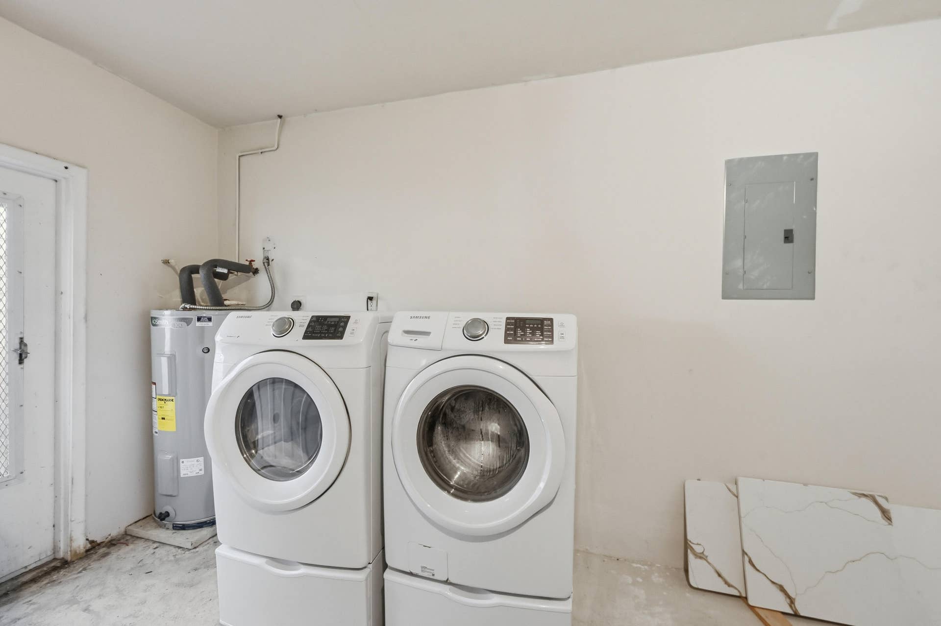 DELUX WASHER AND DRYER. NEW WATER HEATER