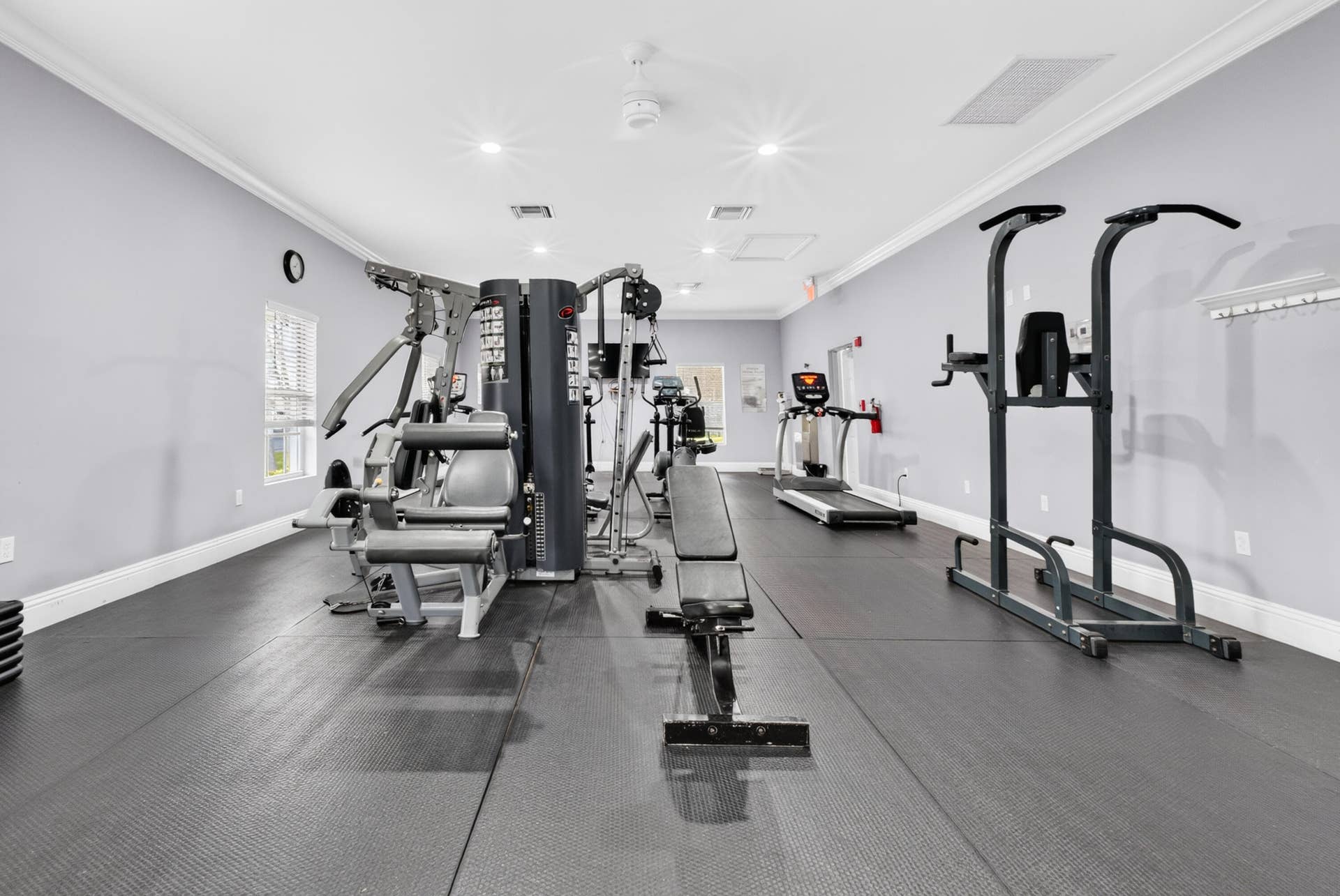 6359 Bay Club Drive, #2, Fort Lauderdale, FL 33308 Fitness area featuring rubber flooring, recessed lighting, and crown molding