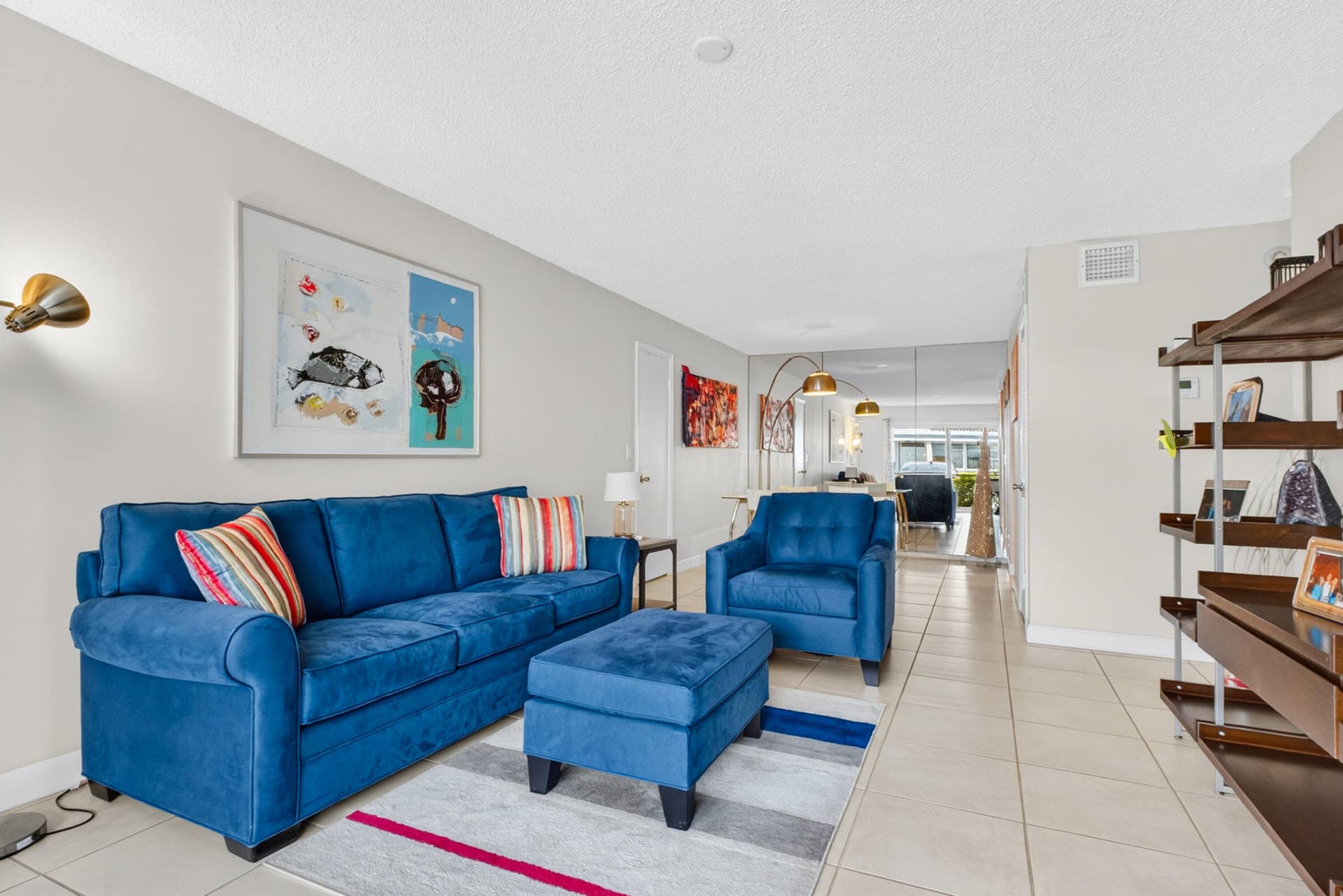 6359 Bay Club Drive, #2, Fort Lauderdale, FL 33308 Tiled flooring throughout, light-toned wall paint, and a built-in shelving unit