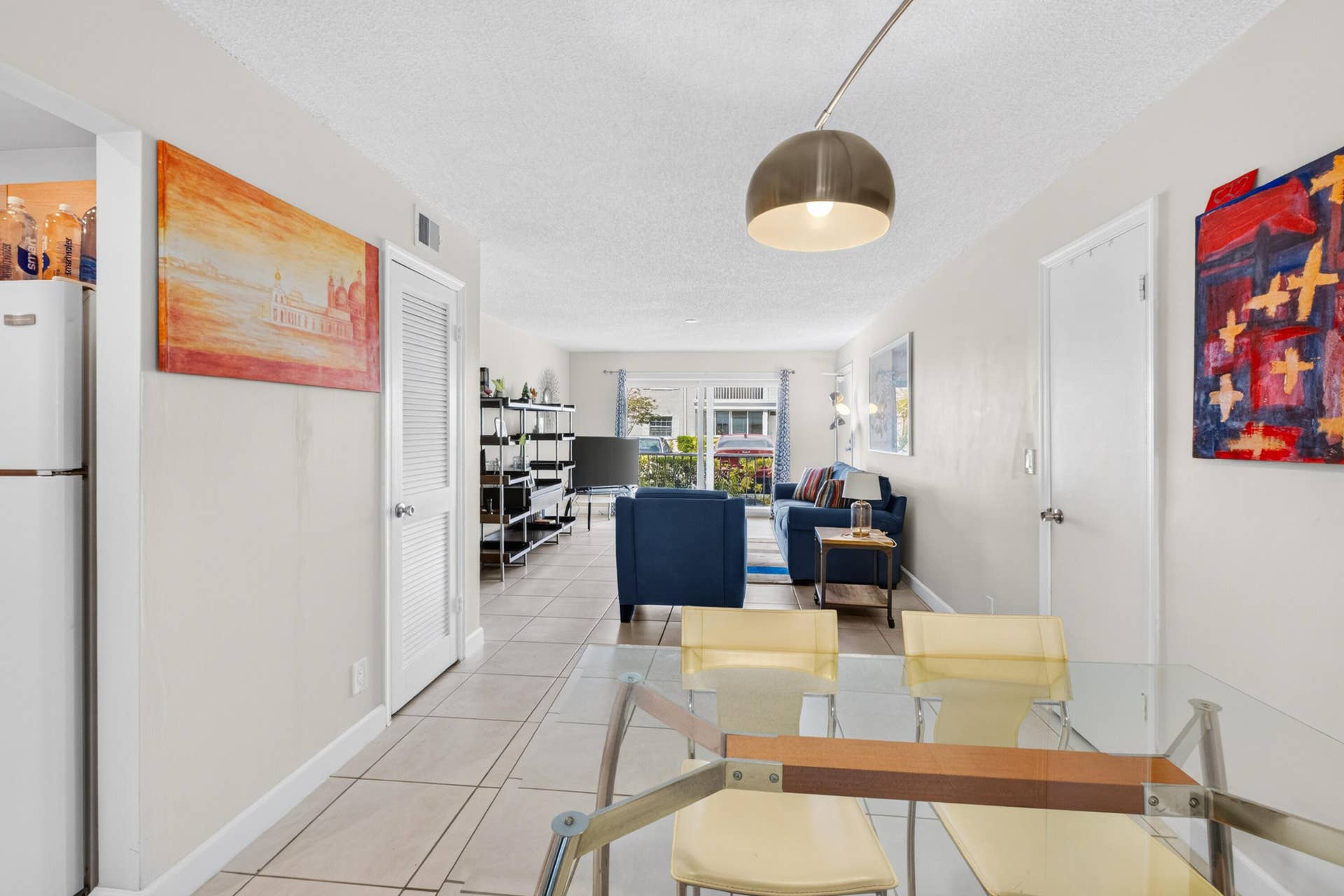 6359 Bay Club Drive, #2, Fort Lauderdale, FL 33308 Tile flooring throughout, recessed lighting, and a modern pendant light fixture