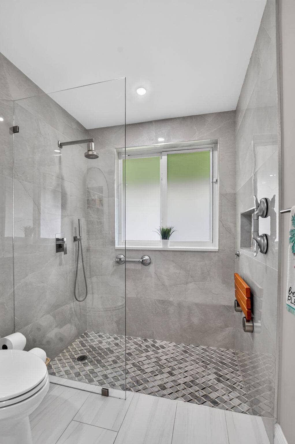 2738 DEER CREEK KELLY BROOKE Lane, Deerfield Beach, FL 33442 Gorgeous primary bath boasts dual shower heads, and elegant, oversized porcelian shower walls.