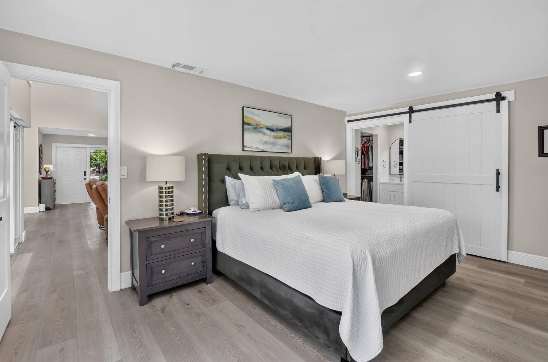 2738 DEER CREEK KELLY BROOKE Lane, Deerfield Beach, FL 33442 Fall in love in the oversized primary suite with a 4' rolling barn door for privacy.