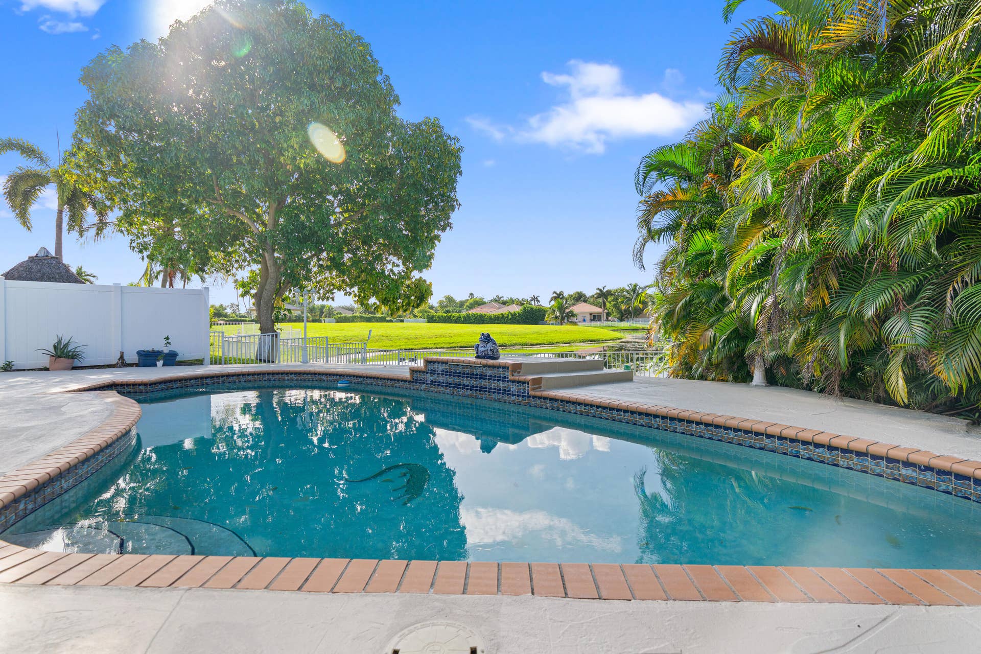 Inviting pool and surrounding deck create a private setting for enjoying South Floridas year-round sunshine.