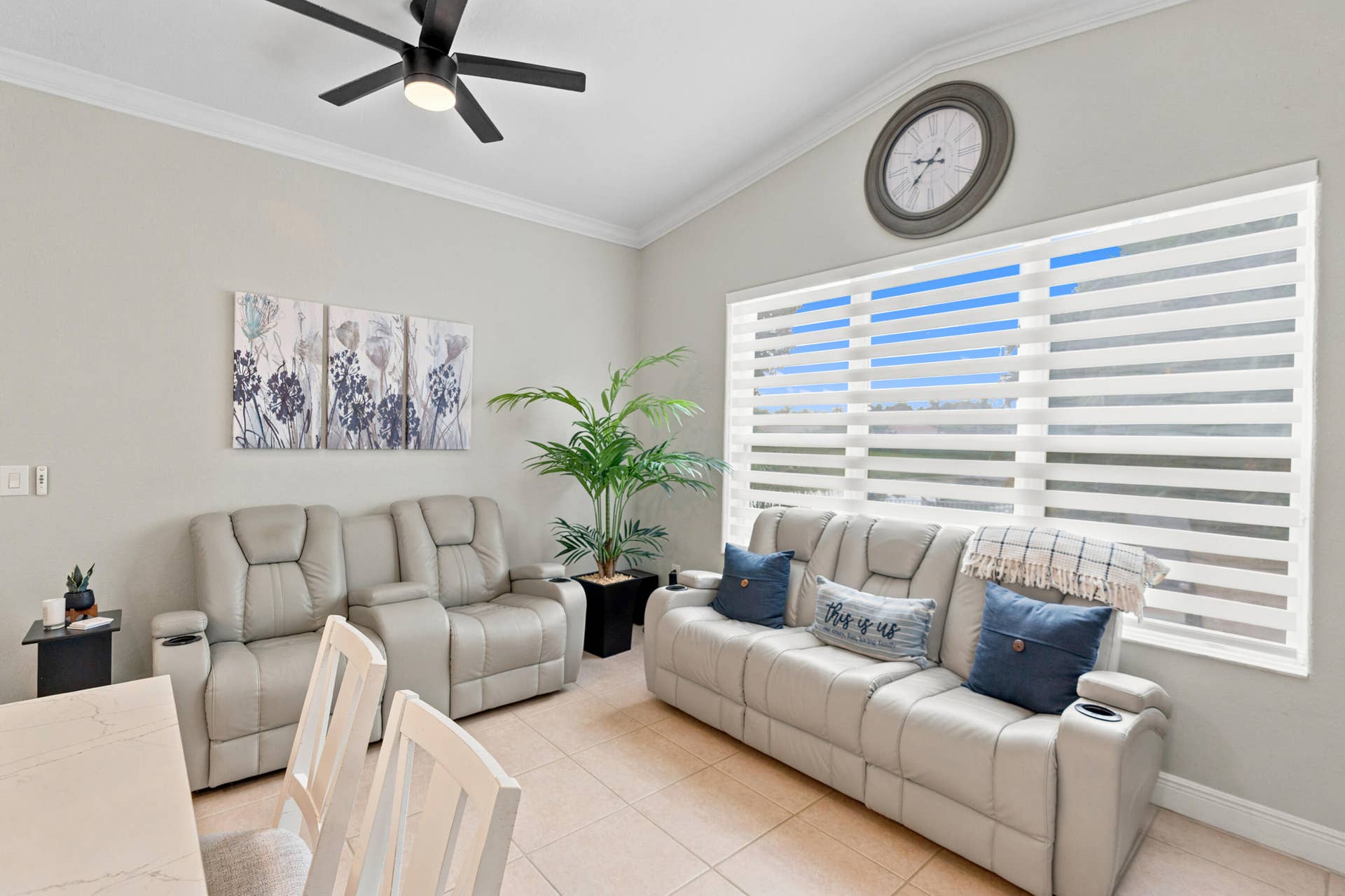 A bright family room provides comfortable gathering space just steps from the kitchen.