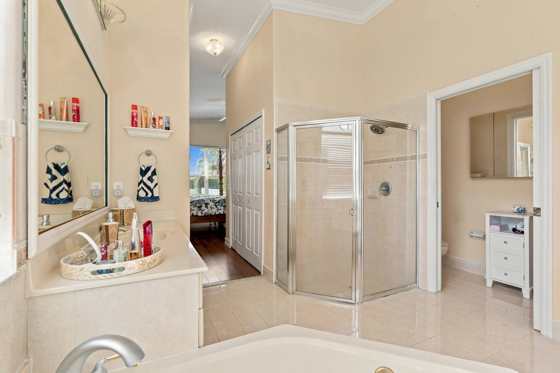 Separate shower and private water closet complete the primary baths functional layout.