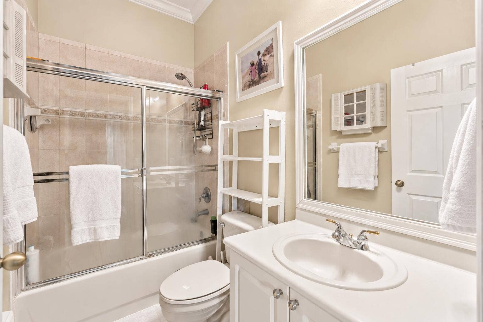 Virtually staged bathroom showing the potential with neutral paint.