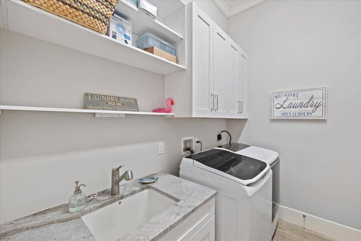 205 Body Court, Jupiter, Jupiter, FL 33477 Laundry Room with sink and drying area