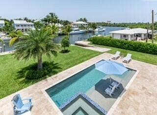 205 Body Court, Jupiter, Jupiter, FL 33477 Heated Salt Water Pool with Sun Shelf