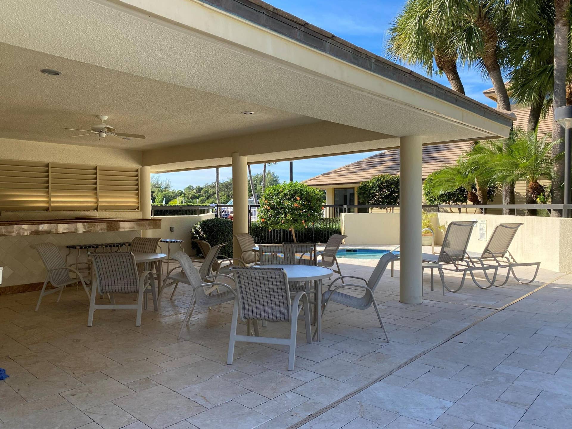 337 Oak Harbour Drive, Juno Beach, Juno Beach, FL 33408 Covered seating area by pool oak