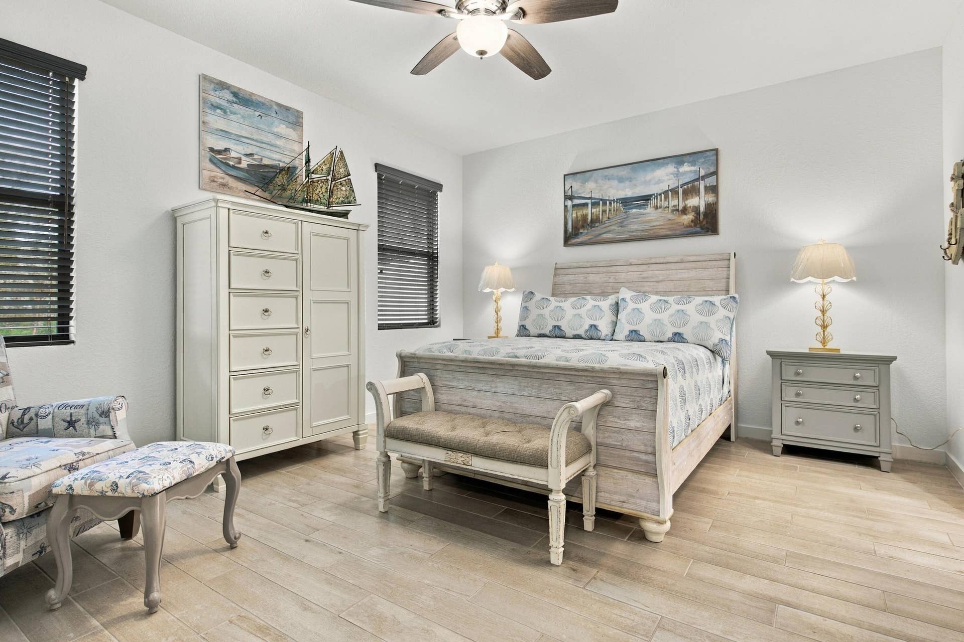 Primary bedroom with customed blinds, light fixture ceiling fan, walkin closet, luxury ceramic wood like floors