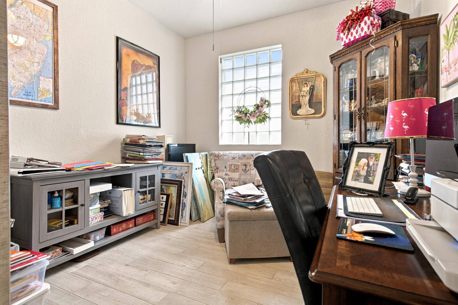 4th Room can be used as a den, office or bedroom. Has luxury wood tiles, ceiling fans,, customed closet.
