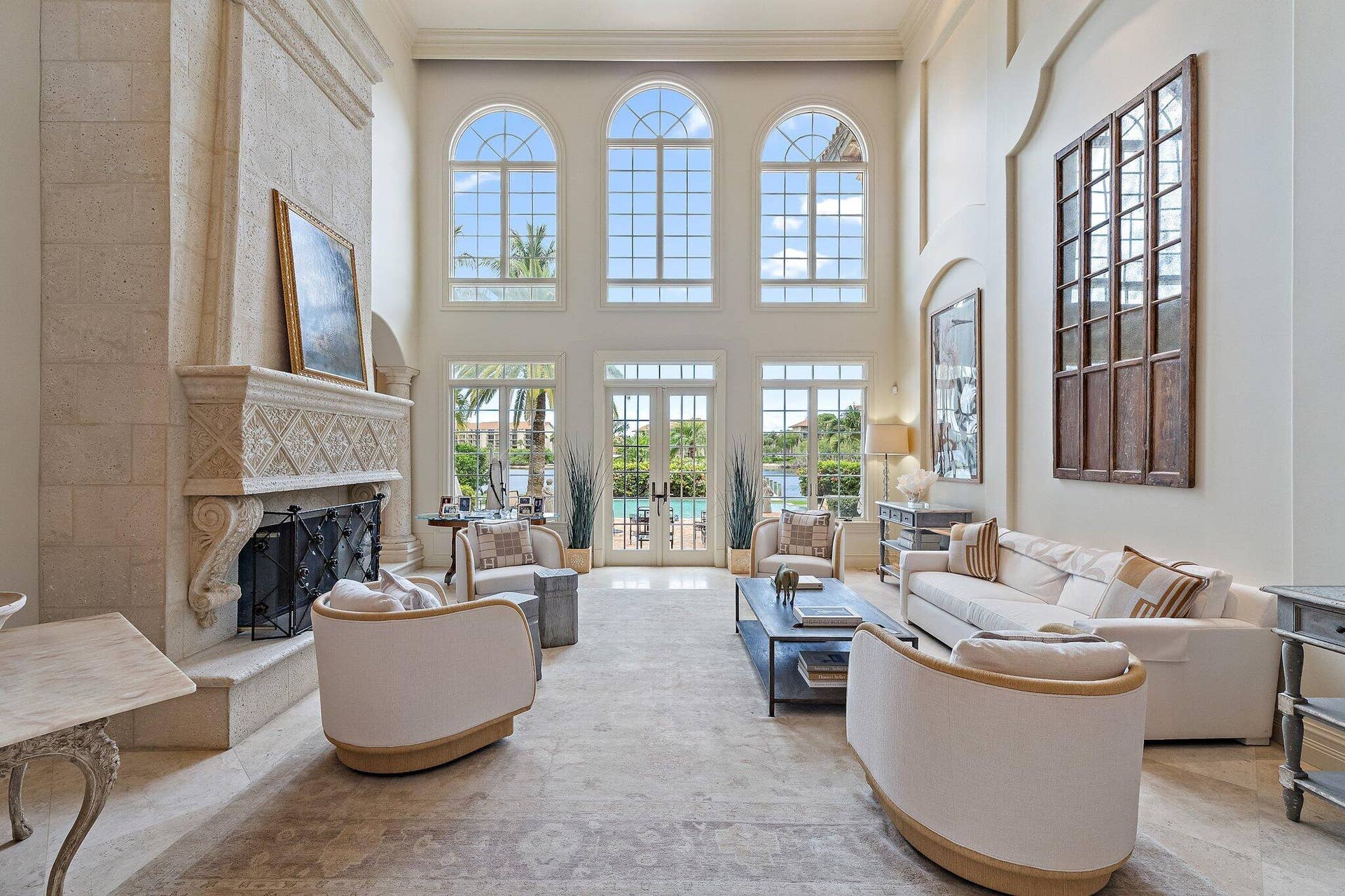 14898 PALMWOOD Road, Palm Beach Gardens, FL 33410 floor to ceiling windows, marble floors + a grand fireplace