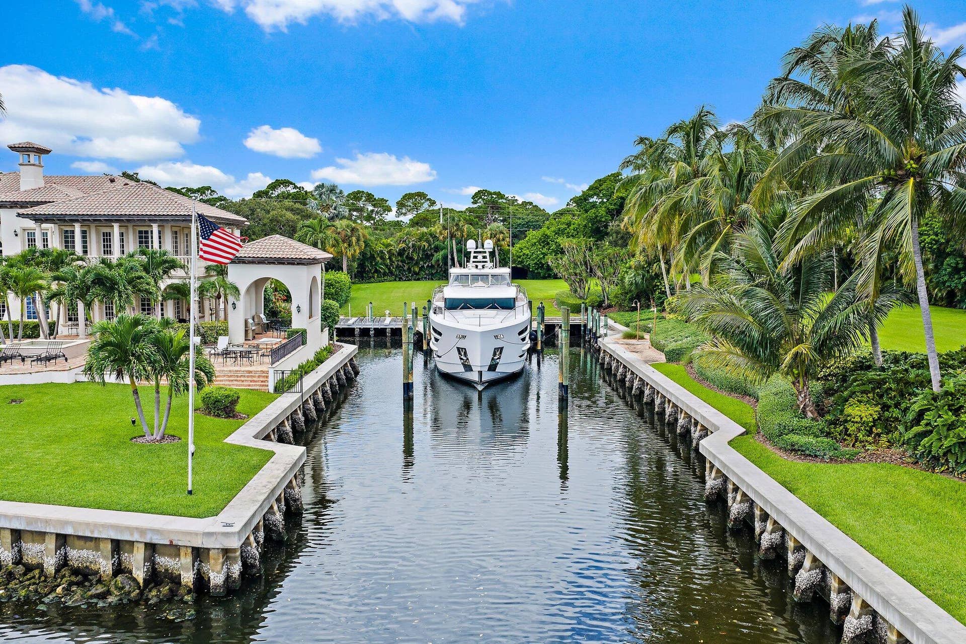 14898 PALMWOOD Road, Palm Beach Gardens, FL 33410 boat is 85', this 'hurricane hole' accommodates + protects mega yacht(s)