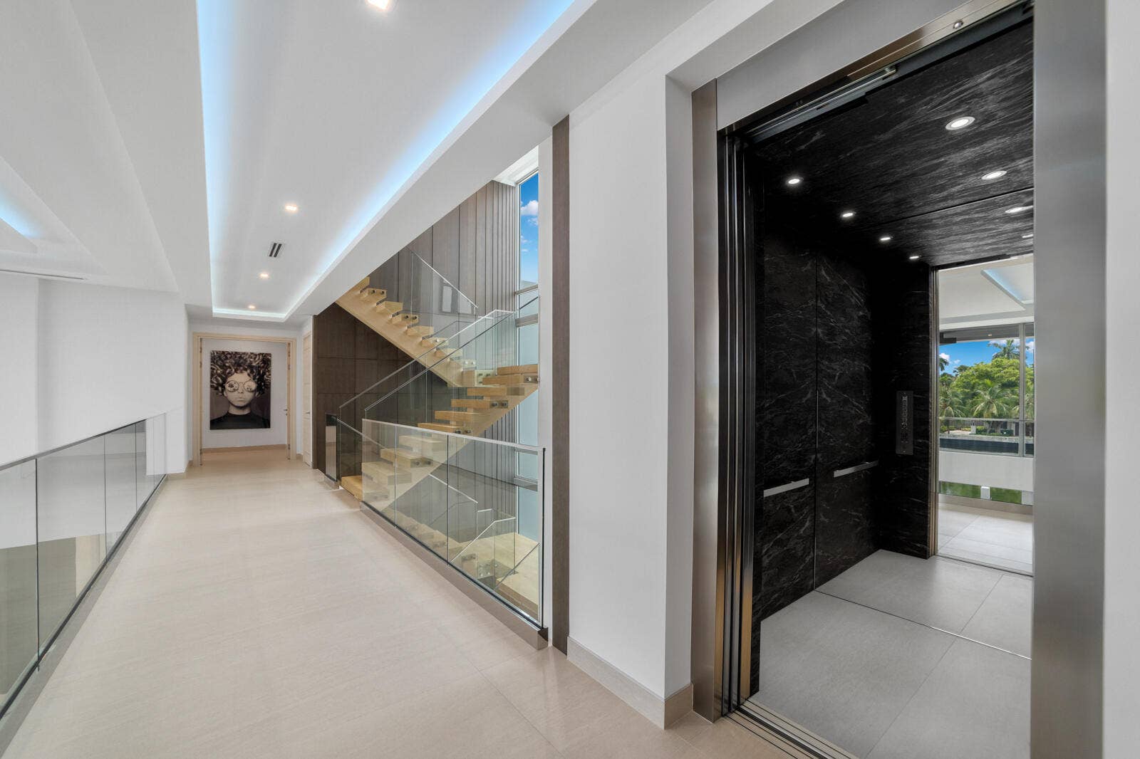 414 ROYAL PLAZA Drive, Fort Lauderdale, FL 33301 Private elevator with a dramatic black marble interior provides effortless access to every level of the residence.