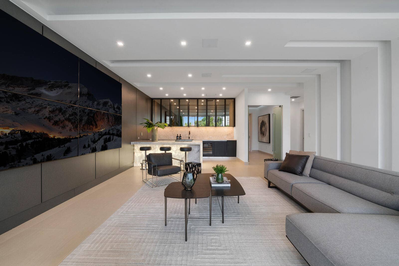 414 ROYAL PLAZA Drive, Fort Lauderdale, FL 33301 Exceptional first-floor VIP guest suite featuring a spacious private lounge, oversized media wall, full bar, designer finishes, and a private bedroom and bath.