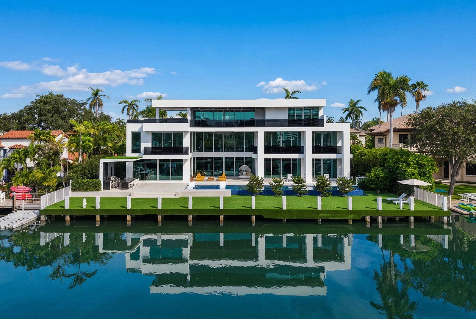 414 ROYAL PLAZA Drive, Fort Lauderdale, FL 33301 Magnificent waterfront estate commanding 125 feet of deep-water frontage on an exceptionally wide canal, featuring a spectacular 75-foot infinity-edge pool, expansive turf-finished dock, and three extraordinary levels of modern luxury.