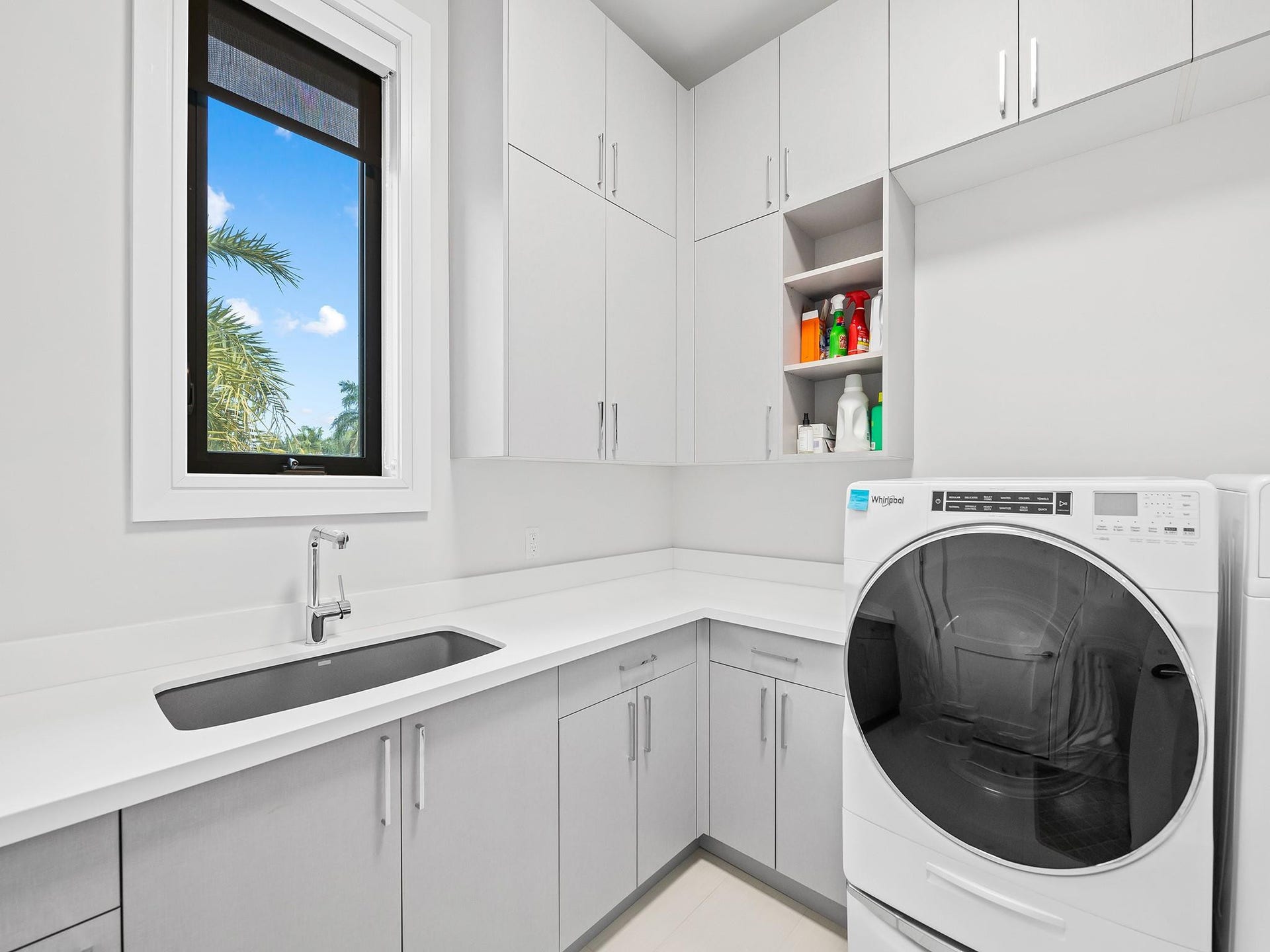 301 NE 23RD Avenue, Fort Lauderdale, FL 33305 Such a spacious laundry room with plenty of storage and closet space