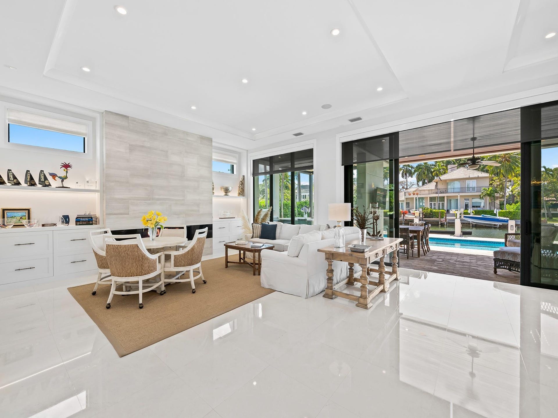 301 NE 23RD Avenue, Fort Lauderdale, FL 33305 Custom built shelving seamlessly integrated into the living room