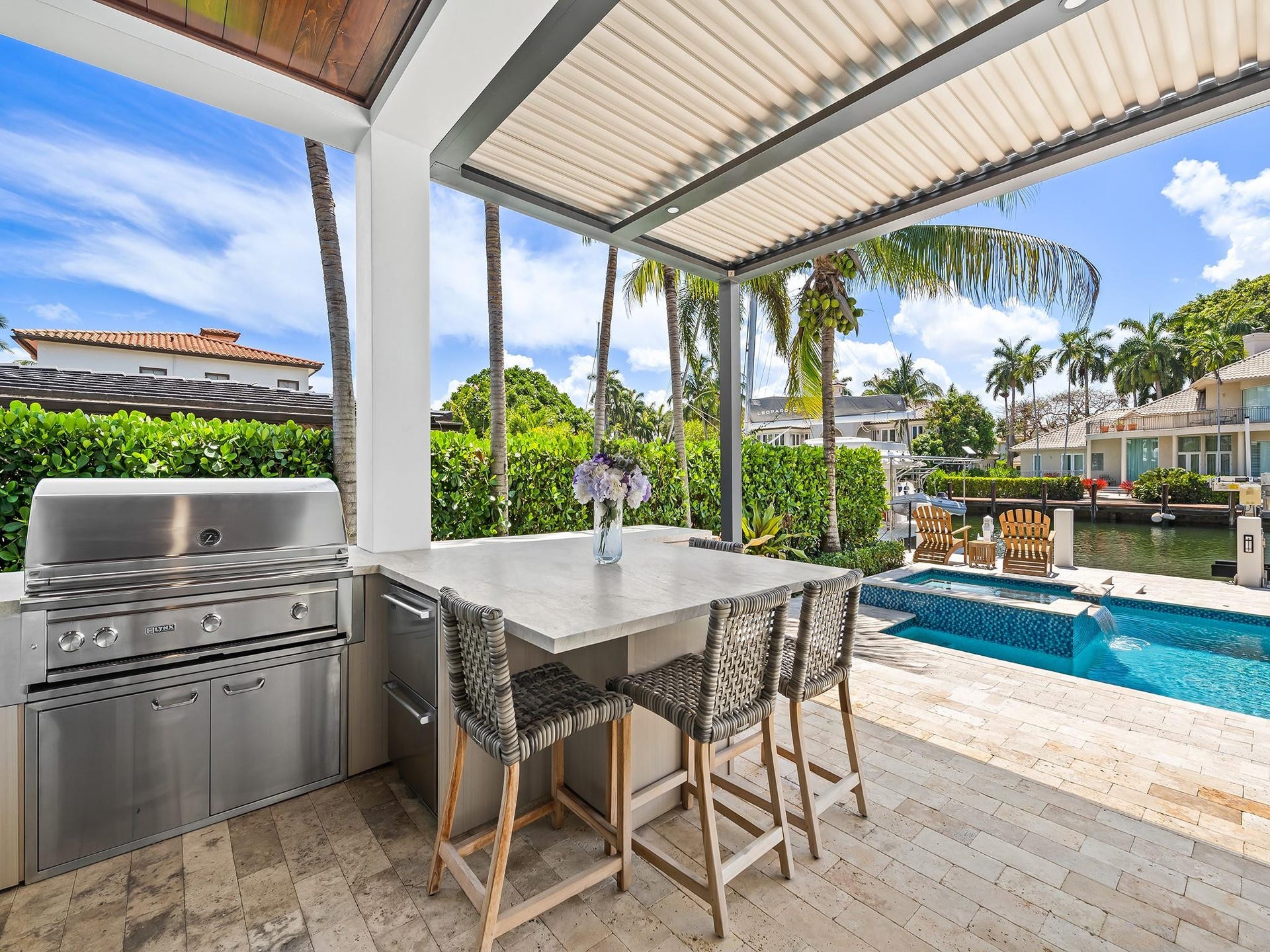 301 NE 23RD Avenue, Fort Lauderdale, FL 33305 Newly built summer kitchen with Pergola X is fantastic for social gatherings.
