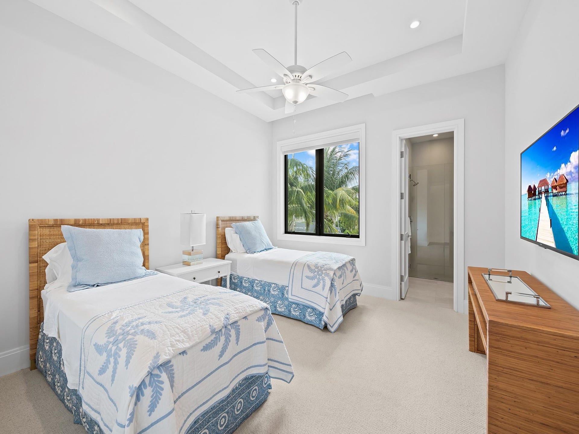 A welcoming bedroom with ample space, natural light with walk-in closet