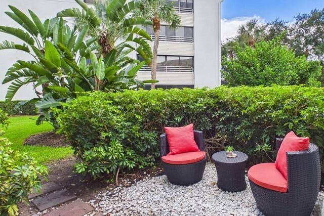 412 Coral Cove Drive, North Palm Beach, FL 33408 Rear garden sitting area