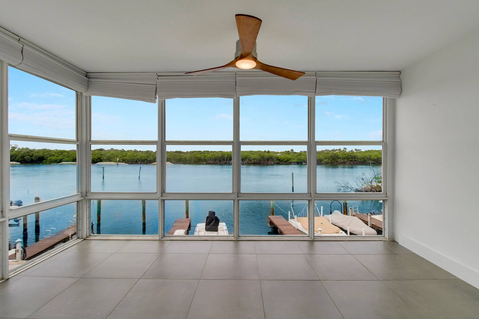325 S Beach Road, #210, Tequesta, FL 33469 enclosed porch from primary bedroom