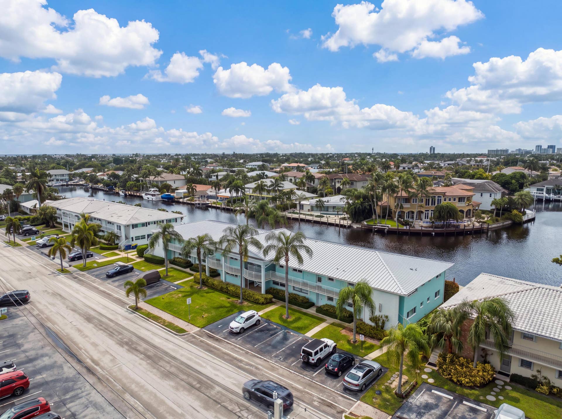 2330 NE 36th Street, #11, Lighthouse Point, FL 33064 Waterfront community with multi-level residences, canal access, and mature landscaping