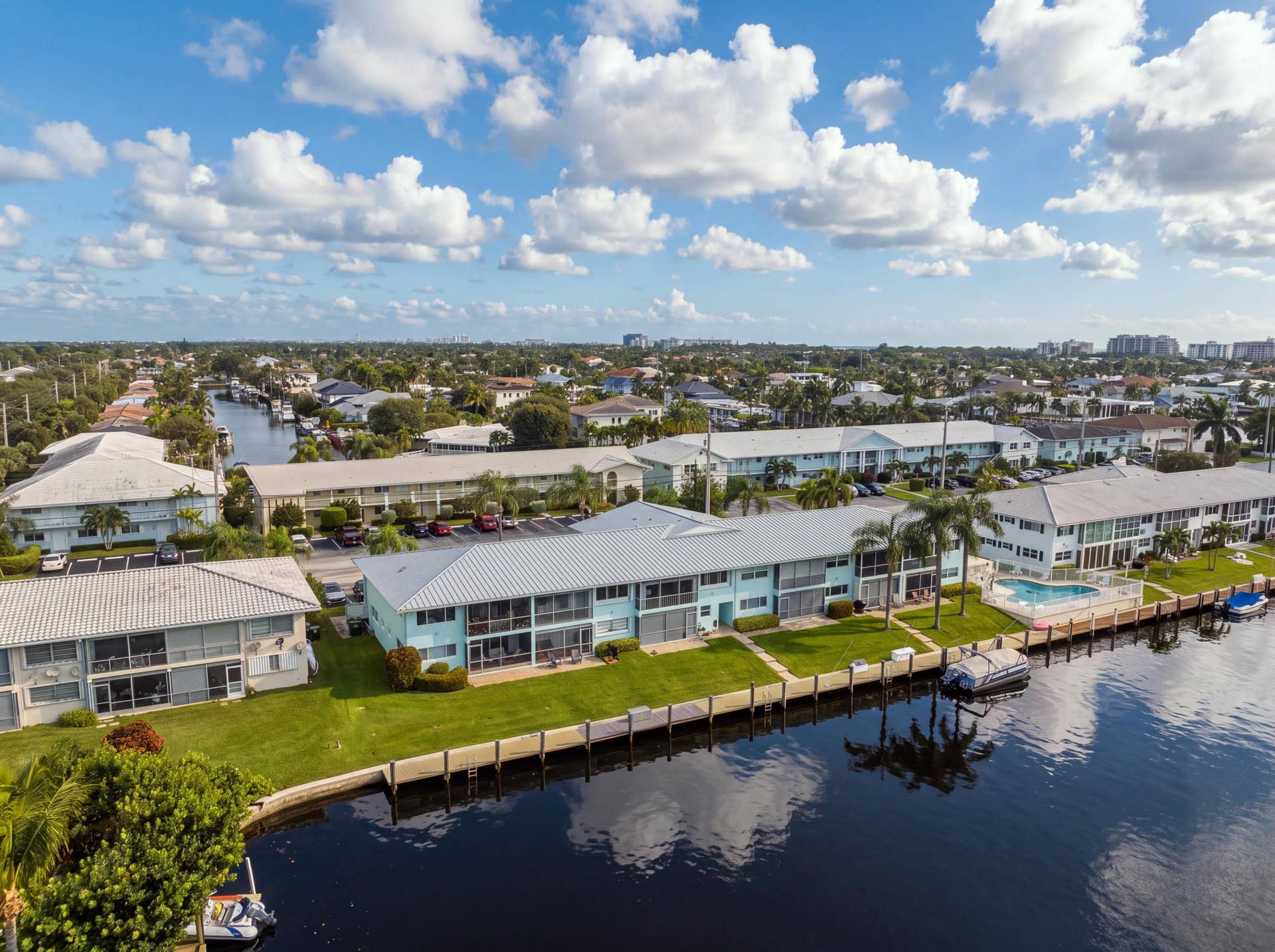 2330 NE 36th Street, #11, Lighthouse Point, FL 33064 Waterfront properties featuring private boat docks and a communal swimming pool