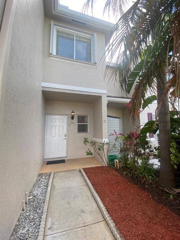 791 NW 42ND Place, Deerfield Beach, Deerfield Beach, FL 33064 Two-story exterior with a covered entry