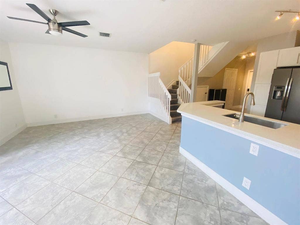 791 NW 42ND Place, Deerfield Beach, Deerfield Beach, FL 33064 Spacious Living & Dining room combination. Tile flooring throughout, contemporary ceiling fan,