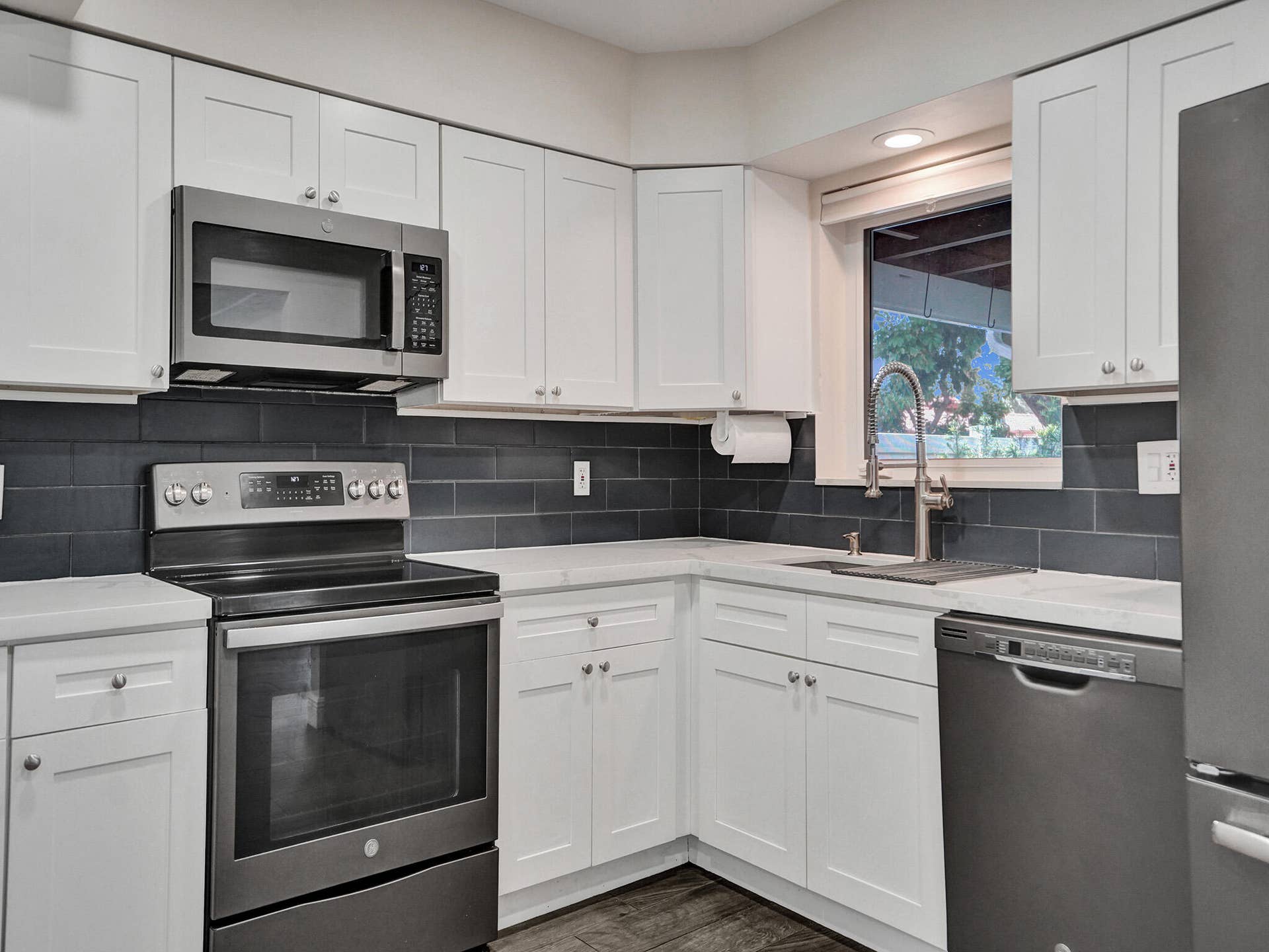 4309 JOHNSON Street, Hollywood, FL 33021 Large modern gourmet chef's kitchen with plenty of storage space for food and your small appliances