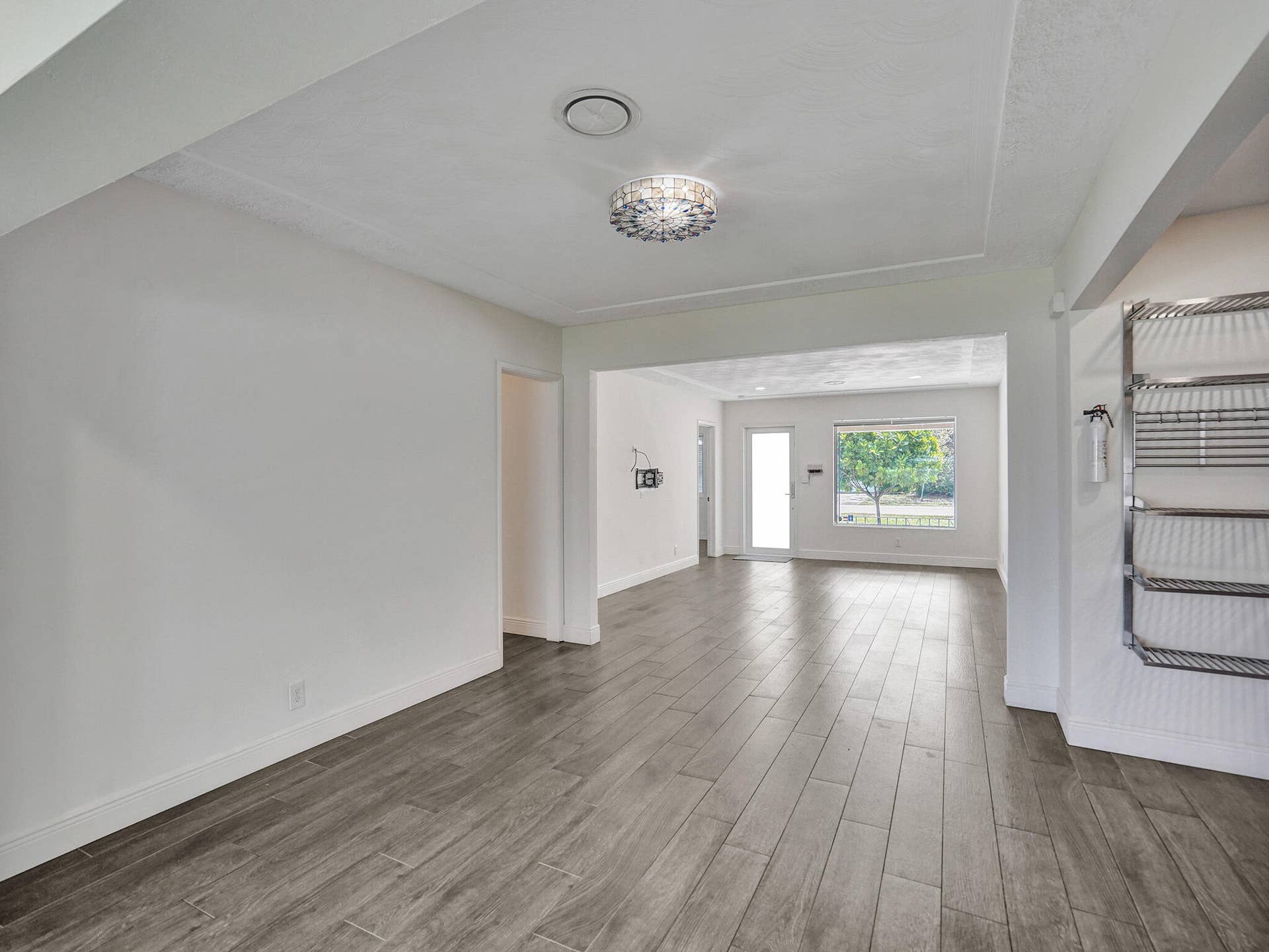 4309 JOHNSON Street, Hollywood, FL 33021 Large modern gourmet chef's kitchen with pass-through to the screened patio area.